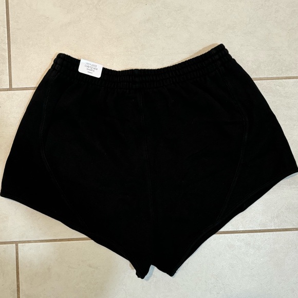 PINK - Curved Hem Shorts - Picture 2 of 4